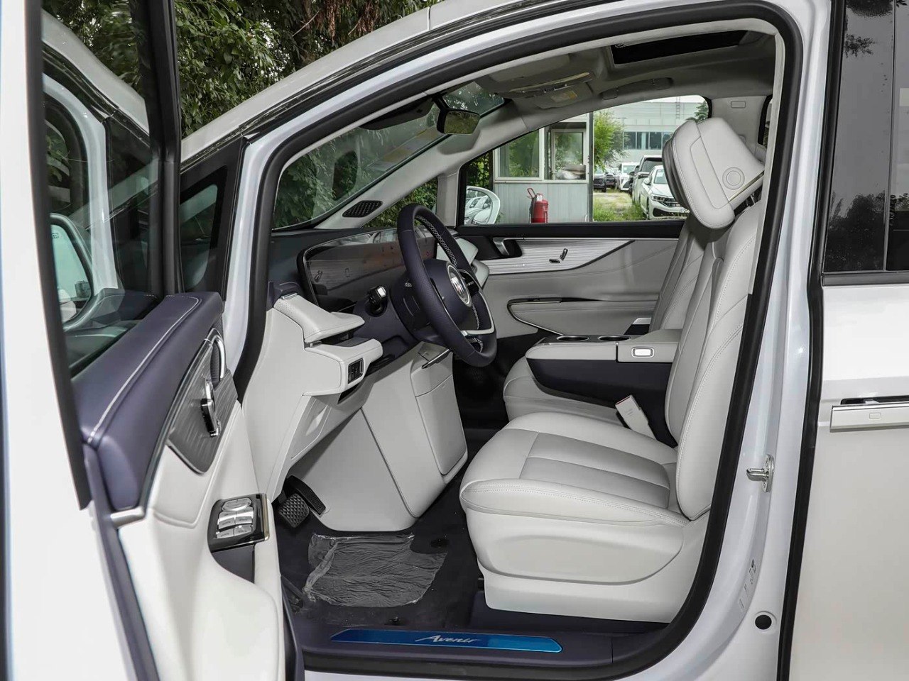 Buick GL8 Avenir PHEV interior door open white leather