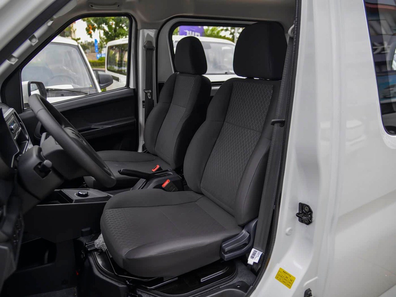 Changan Ruixing EV front seats door open view