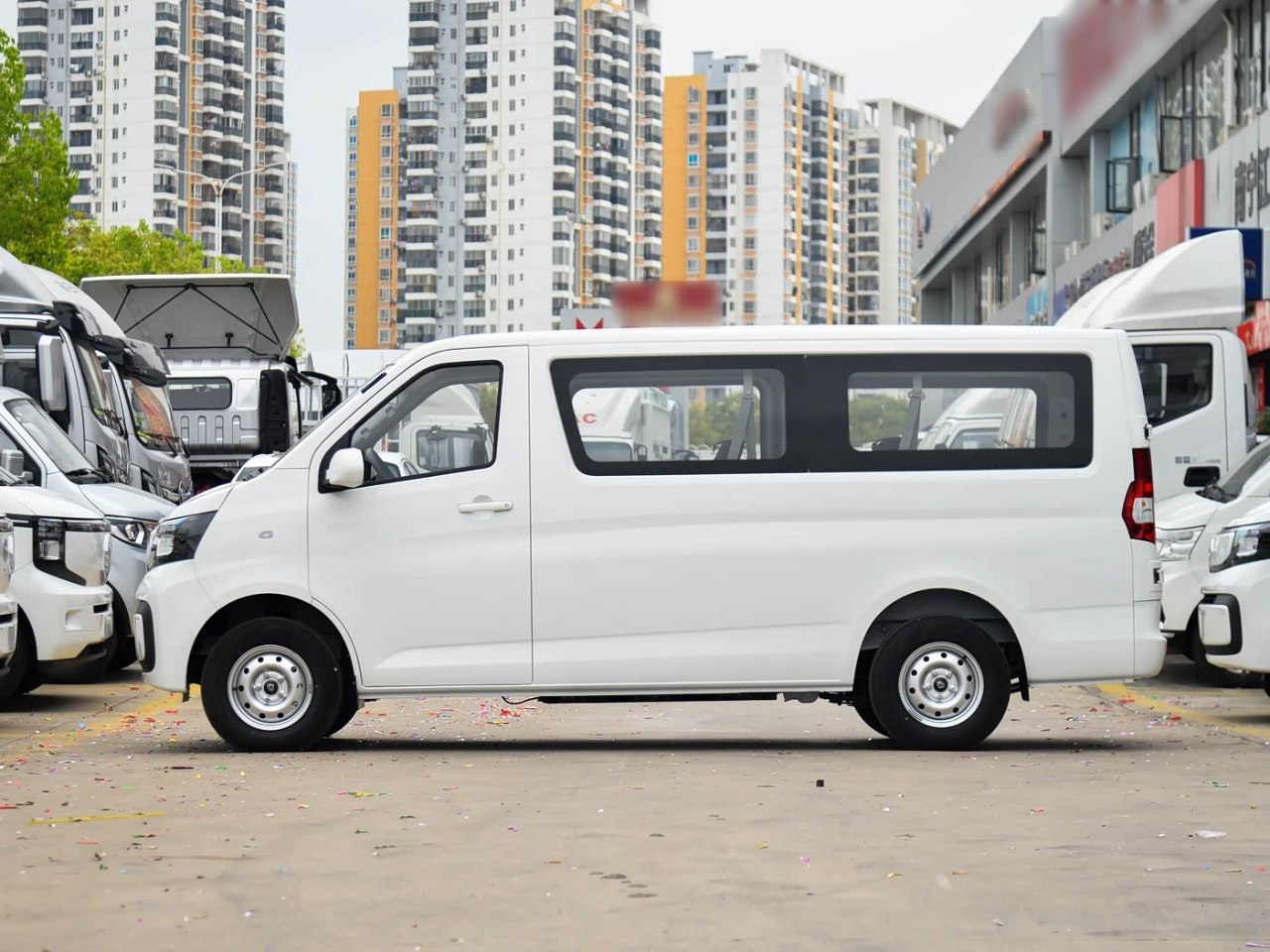 Changan Ruixing EV side profile white rear view