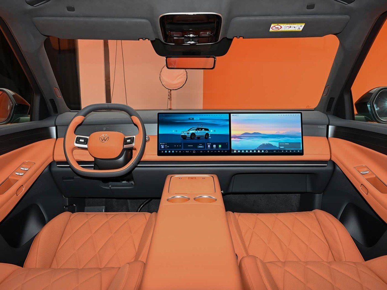 Volkswagen ID.ERA 9X interior orange seats dual screen