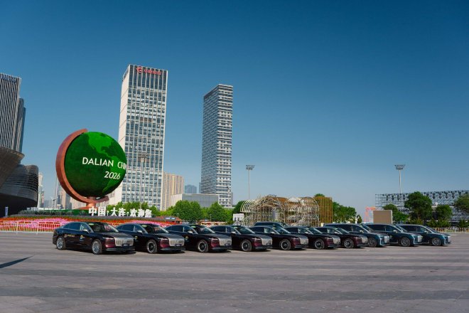 Voyah electric vehicle fleet lined up in Dalian for the 2026 Summer Davos Forum